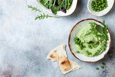 Green Pea Hummus Spread Or Dip With Mix Salad Leaves Healthy Raw