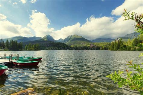 Landscape Of The Picturesque Lake Surrounded By Mountain Peaks And