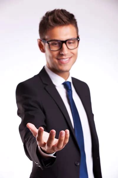 Business Man Holding Something On His Hand — Stock Photo © Feedough