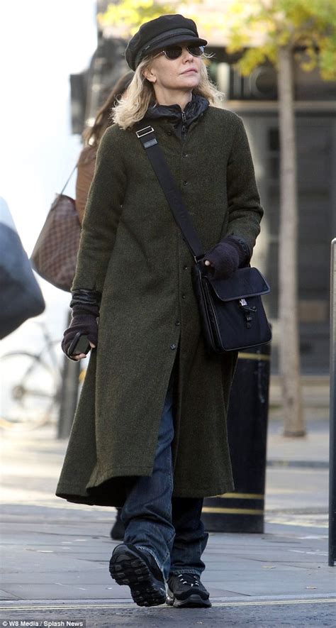 Meg Ryan Goes Incognito In A Cap Sunglasses And Long Coat For A London Shopping Trip Daily