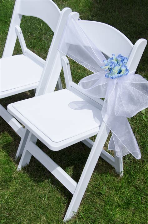 Resin refers to both rattan and composite styles of garden furniture, where the material is a synthetic polymer. White Resin Padded Chair | The Party Centre