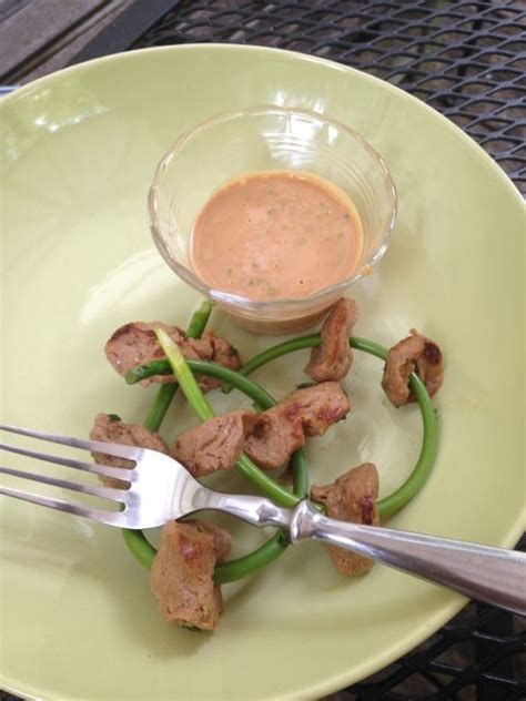 Maybe you would like to learn more about one of these? Garlic Scape and Seitan Satay with Spicy Peanut Sauce