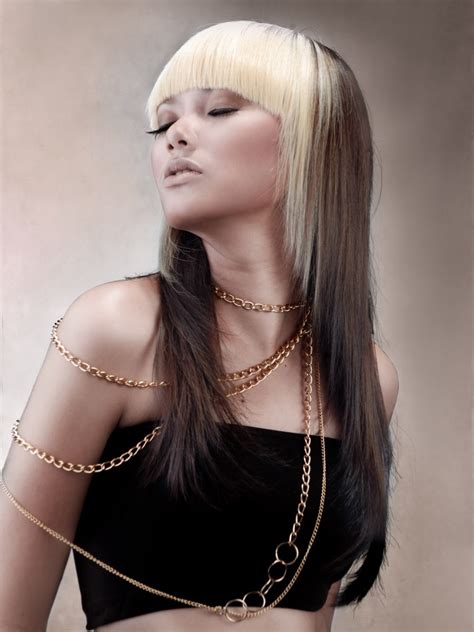 Without this copper tone, your hair lacks the depth required to be dyed with a darker color. Bright platinum hair and brown hair combined in a long ...