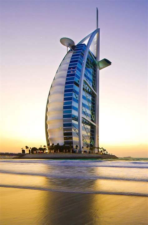 shaped to resemble the sail of a ship the burj al arab jumeirah is an iconic luxury hotel