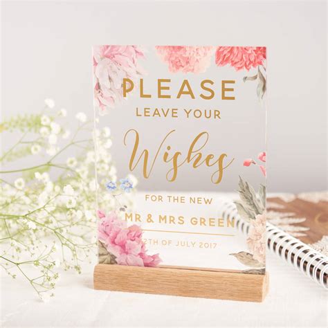 Why you need a wedding guest book in 2020. personalised floral and gold guest book wedding sign by ...