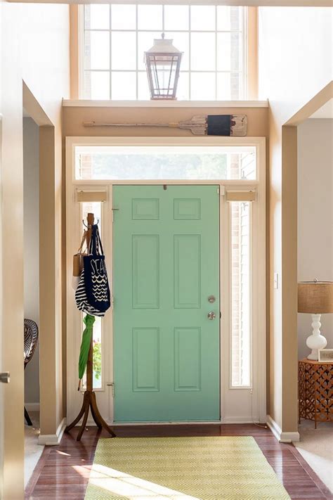 A green front door combined with matching shutters on both sides can turn an ordinary house into a classic cottage. Adrienne Gilliam's Indianapolis Home Tour - The Everygirl ...