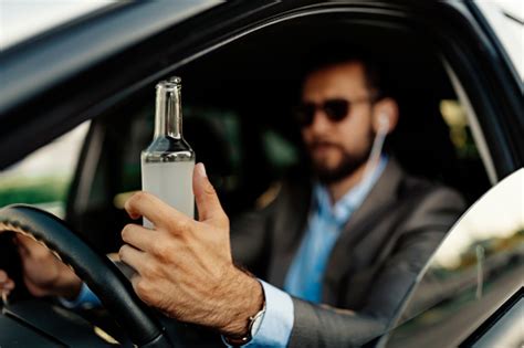 Man Drinking While Driving Stock Photo Download Image Now