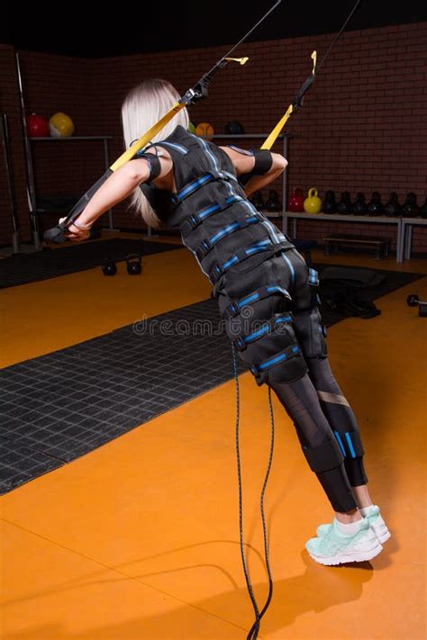 Woman With Back In Electrical Muscular Stimulation Stock Photo Image