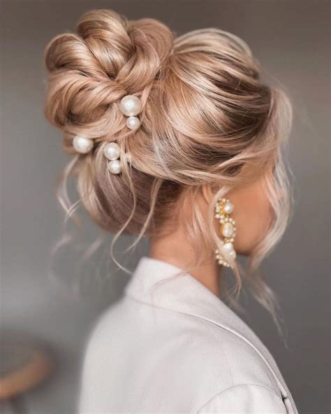 40 Beautiful Updo Hairstyles For 2022 Loose Side High Bun Hairstyle