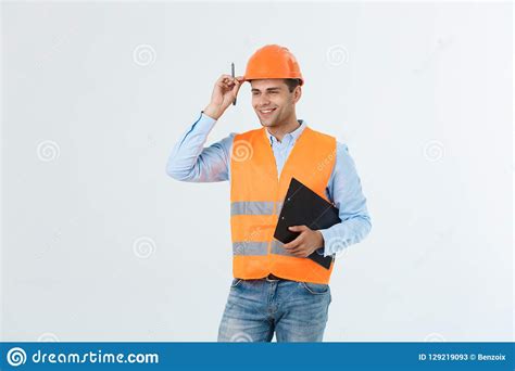 Smiling Construction Engineer Posing Isolated Over Grey Background