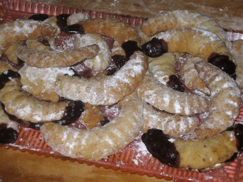 Toss the warm cookies in the powdered sugar. Slovakian Cookies | Christmas Eve Dinner | Slovak recipes, Czech recipes, Recipes