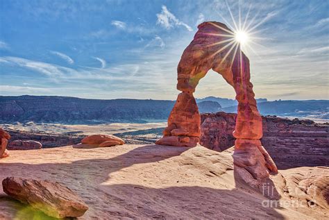 Delicate Arch Sun Flare Arches National Park Utah Photograph By Dustin