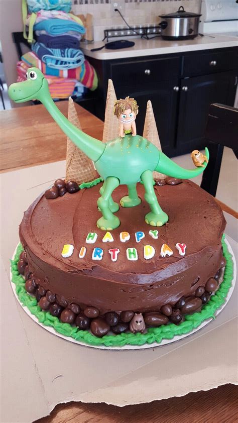 For a dinosaur birthday cake consider a wilton cake pan. Good Dinosaur birthday cake