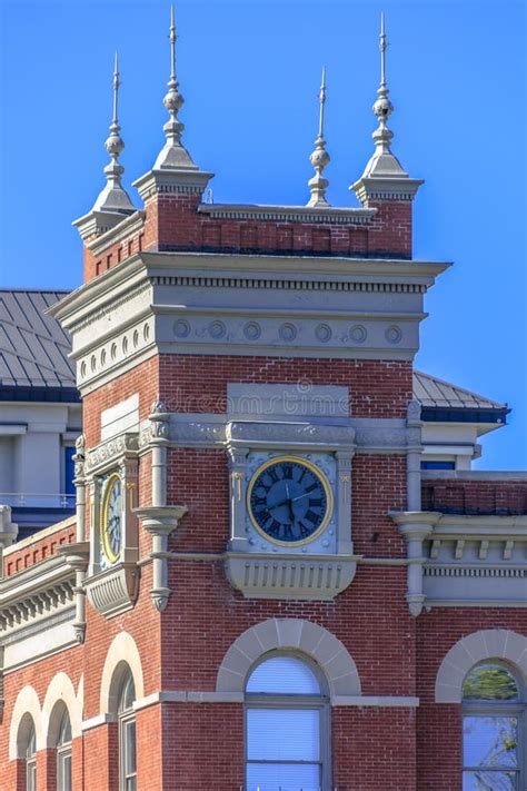 Red Brick Building With Time Clock Stock Image Image Of Traditional