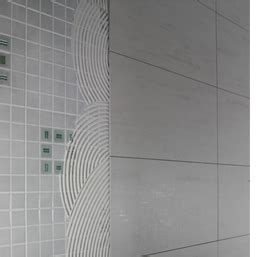 You can go with a fairly simple tile treatment, or use your shower area to make a big statement. HOME DZINE Home Improvement | Cover up existing tiled wall ...