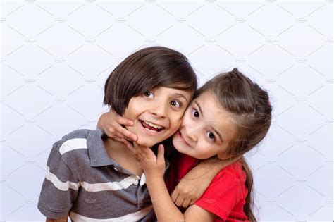 Two Kids Hugging Each Other Background Stock Photos ~ Creative Market