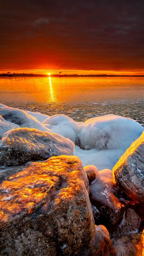Download Wallpaper 938x1668 Sea Sunset Shore Stones Ice Iphone 87