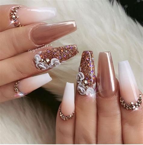 The next nail art is full of interesting design, the big finger it has a snow flake (totally could be a christmas nail). Ombre rose gold | Coffin nails long, Rhinestone nails ...