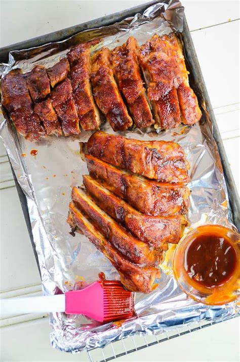 Bring the long edges together first and fold them over a. The Best Oven Baked (Foil-Wrapped) Baby Back Ribs - Home ...