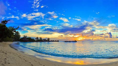 Calm Body Of Water During Sunset Under Blue Sky 4k Hd