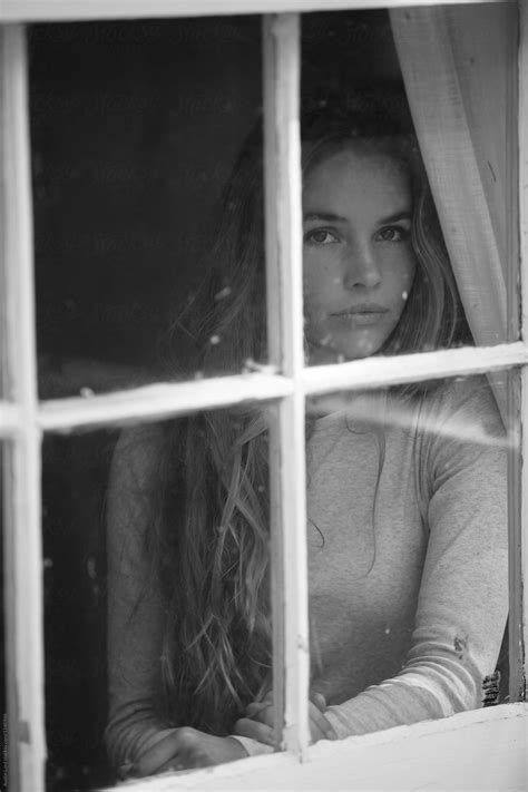Beautiful Woman Looking Out Window By Stocksy Contributor Austin