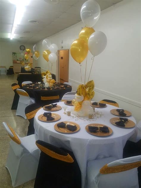 Table decoration for birthday party ideas. Black/cream tables | 50th birthday party decorations