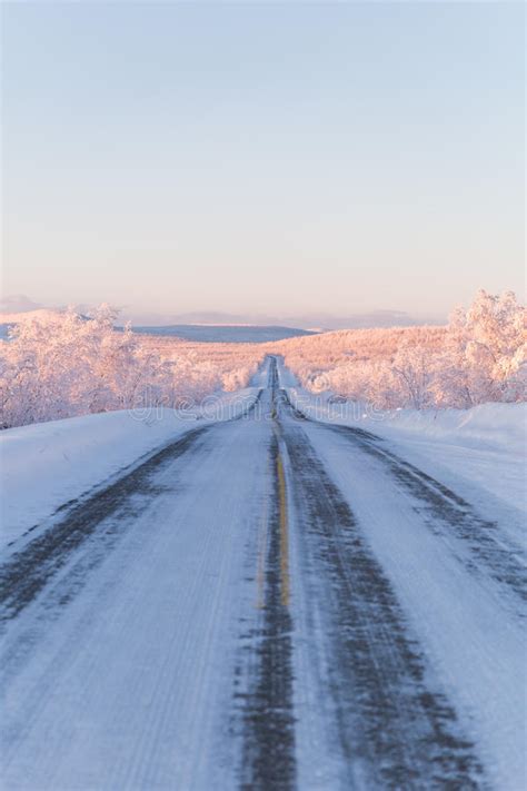 Winter Wonderland Lapland Scene Sunset Road Stock Photo