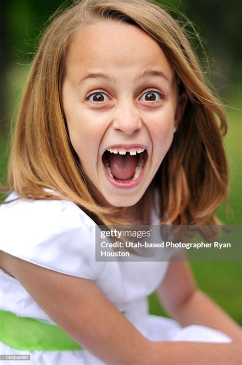 Young Girl With Excited Face High Res Stock Photo Getty Images