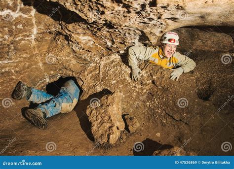 A Young Girl Stuck In Cave Hole Stock Image Image Of Speleology Cave