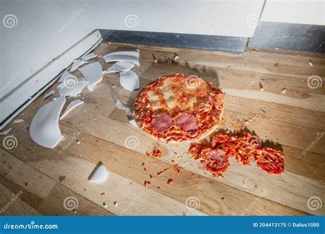 Fallen And Shatter Plate With Food In Kitchen Stock Image Image Of