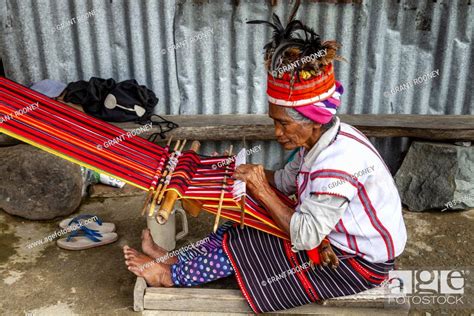 an ifugao tribal woman weaving traditional patterned cloth banaue luzon the philippines