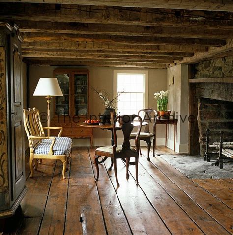 This 18th Century Keeping Room With Rough Hewn Beams Is Where The