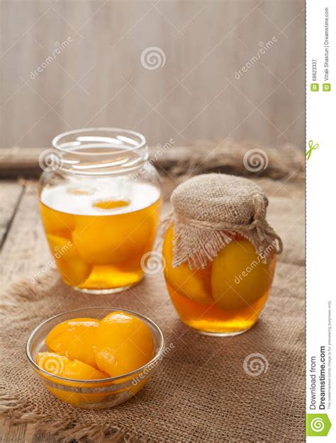Preserved Peach Compote With Whole Peaches In Glass Jars Stock Image
