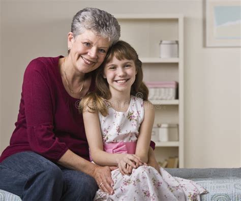 Grandmother And Granddaughter Hugging Stock Photo Picture And Royalty