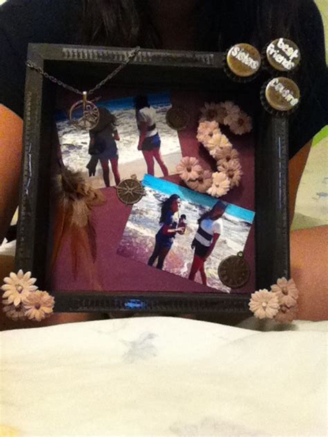 A shadow box I decorated as a picture frame for my best friends