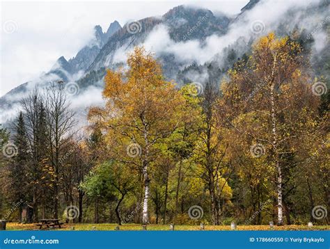 Cloudy And Foggy Autumn Alpine Mountain Scene Austrian Lienzer