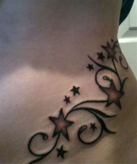 Stars And Swirls Tattoos On Hip