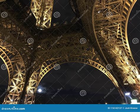 Under The Eiffel Tower At Night Editorial Photography Image Of Arch