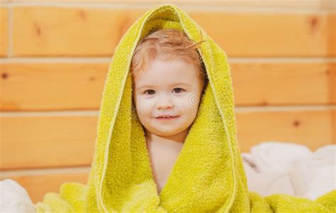 Kids Baby Cover Head Under Towel After Bath Portrait Close Up Head Of