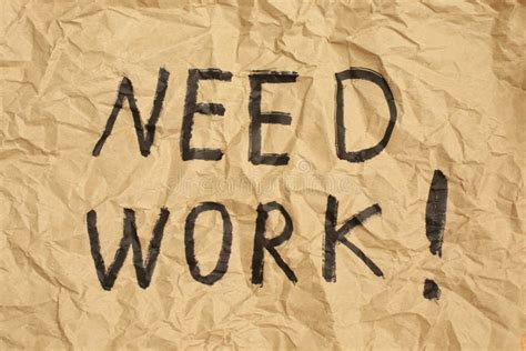 Need Work Sign On Crumpled Brown Recycled Paper Background Stock Image