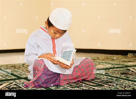 Child Reading Quran Hi Res Stock Photography And Images Alamy