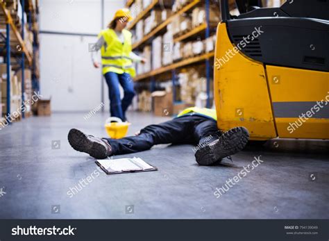 An injured worker after an accident in a warehouse. #Sponsored , #AFFILIATE, #worker#injured# 