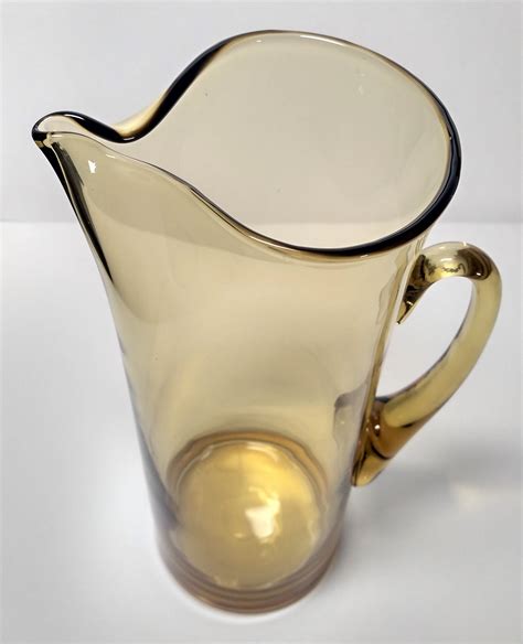 Vintage Yellowbrown Glass Jug In 2020 Glass Jug Yellow And Brown