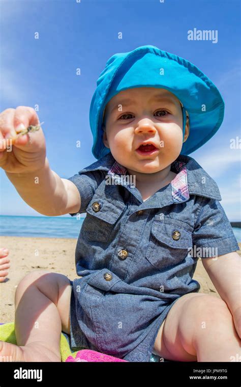 Baby At The Beach Stock Photo Alamy