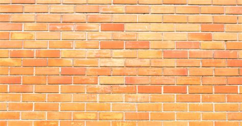 Brown Concrete Brick Wall · Free Stock Photo