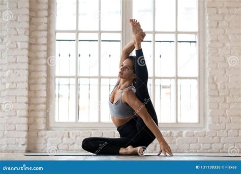 Young Sporty Attractive Woman Practicing Yoga Doing Surya Yantr Stock