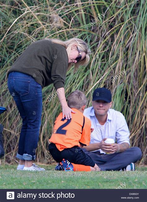 Ryan Phillippe And Reese Witherspoon Talk To Their Son Deacon After His Soccer Game At A Park In