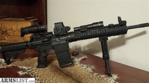 Armslist For Sale Bushmaster Ar 10 308 With Eotech Exps 3 0