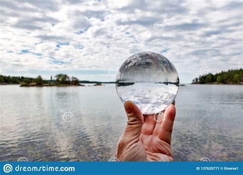 Hand Holding Acrylic Crystal Ball By A Lake Stock Image Image Of