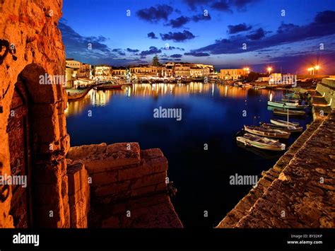 The Old Venetian Harbor Of Rethymno Town Around The Blue Hour Crete